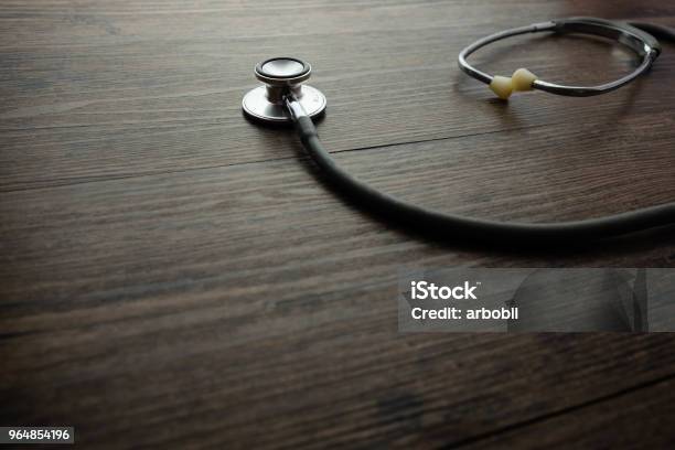 Stethoscope On Wooden Table Background Medical Health Concept Stock Photo - Download Image Now