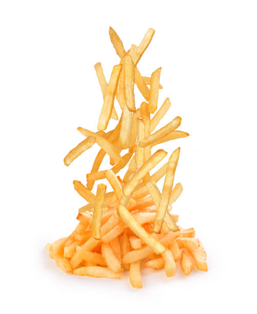 istock French fries fall on white background 964858712