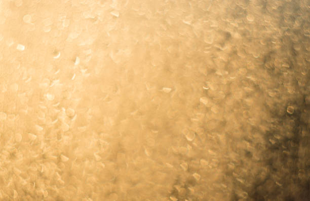 istock Golden bokeh background, glittering shiny abstract background 964864318