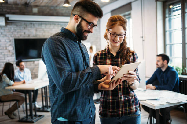 istock Portrait of architects having discussion in office 964868658