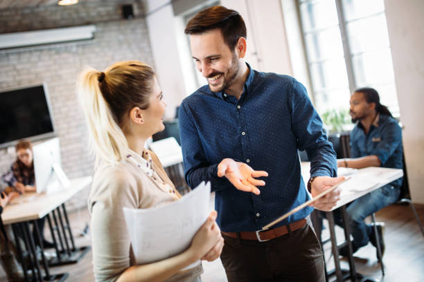 istock Portrait of architects having discussion in office 964868770