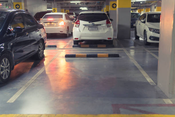 istock Blurred image Parking garage In the mall for background. 964871680