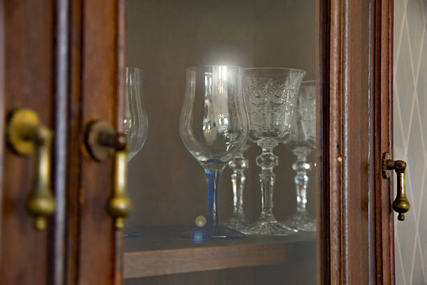 Antique wine glass in old cupboard