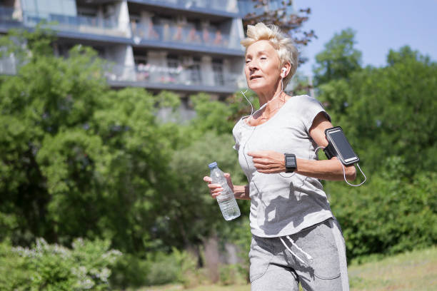 istock Senior woman running 964890736