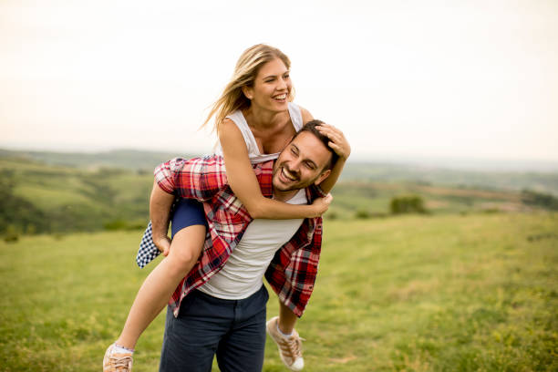 istock Loving coulpe having fun in the spring nature 964895010
