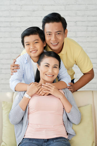 istock Posing for Photography with Loving Parents 964898494