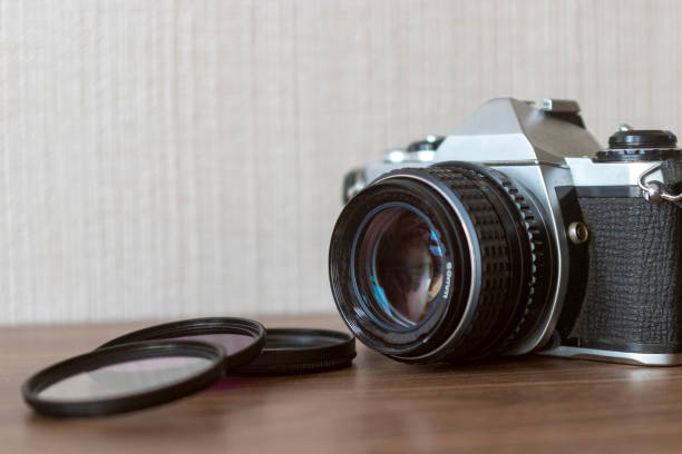 istock View of vintage camera and filters 964898684