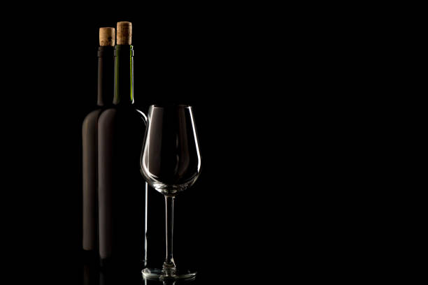istock Wine bottles with cork and glass 964904978