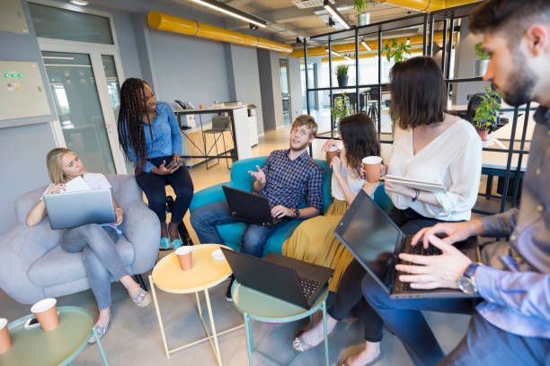 istock Young coworkers in modern office 964907942