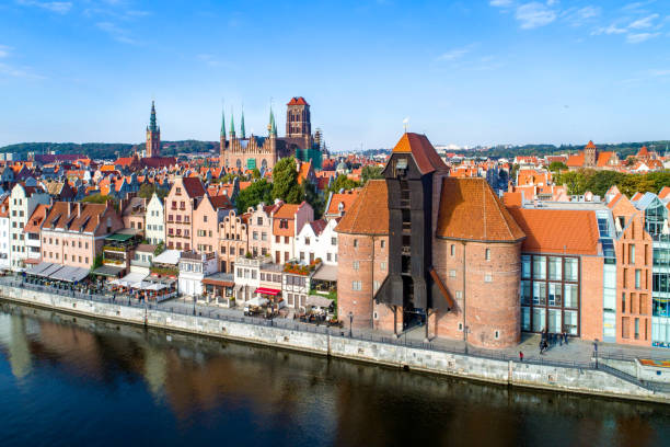 Gdansk old city, Poland. Aerial view. Gdansk old town in Poland with the oldest medieval port crane (Zuraw) in Europe, St Mary church, Town hall tower and Motlawa River. Aerial view, early morning gdansk photos stock pictures, royalty-free photos & images