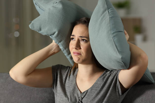 istock Annoyed woman suffering neighbour noise 964911670