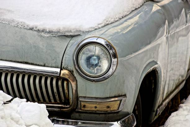 istock Headlight on an old gray retro car 964921074