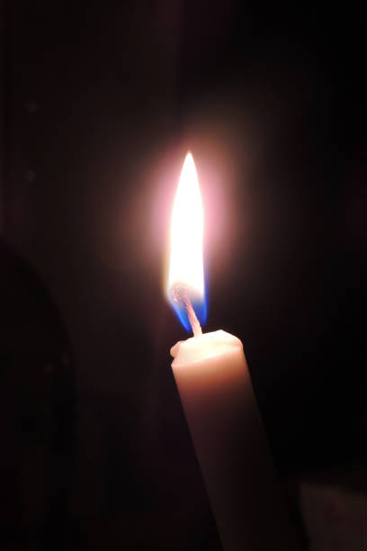 istock The candle is burning. Close-up 964925826