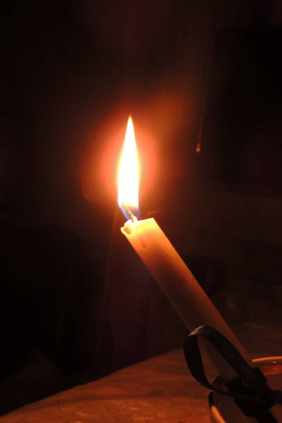 istock The candle is burning. Close-up 964925828
