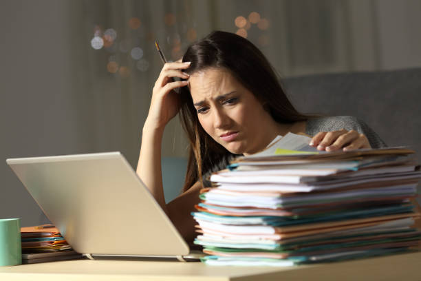 istock Worried self employed working in the night 964928678