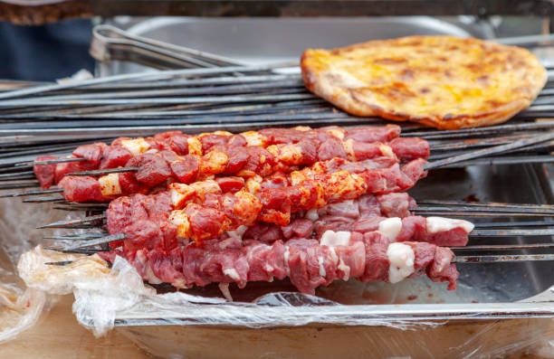 istock Caucasian shish kebab on skewers 964929232