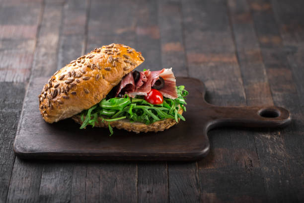 istock Italian sandwich with prosciutto. 964941240