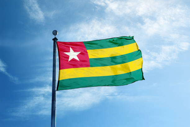 Togo flag on the mast stock photo