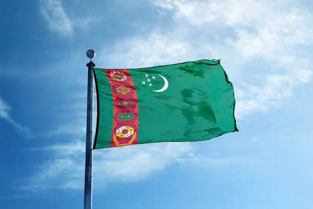 Photo of Turkmenistan flag on the mast