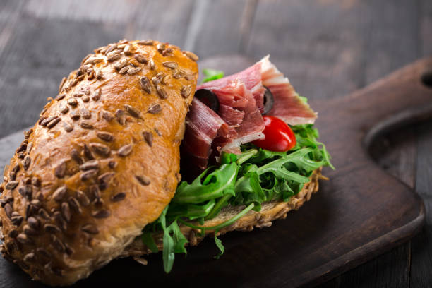 istock Italian sandwich with prosciutto. 964941674