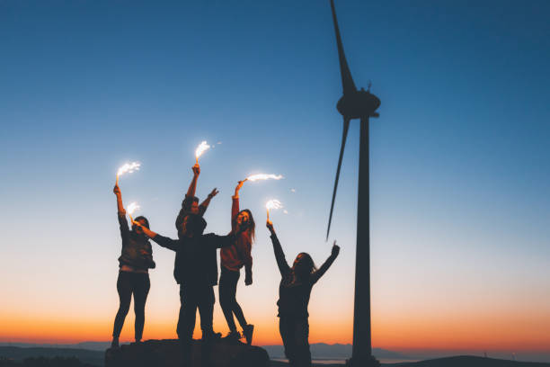 istock Best friends celebrating with sparklers at night 964945214