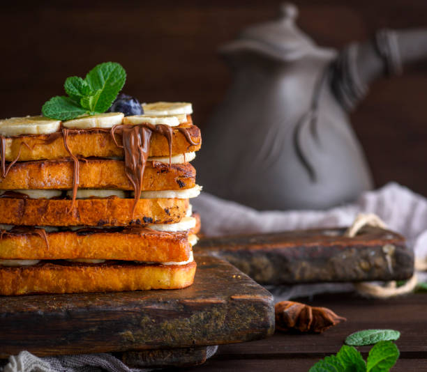 istock square fried bread slices with chocolate and banana 964952278