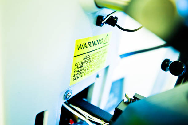 istock Warning or Hazard  Sign / Label: Operators with Heart Condition or Pacemakers Devices Should Not Operate This Machine 964958946