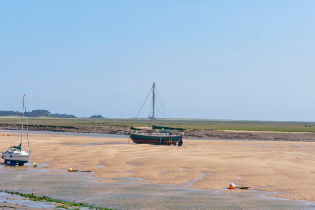 istock Old yacht on a sandbank 964965734