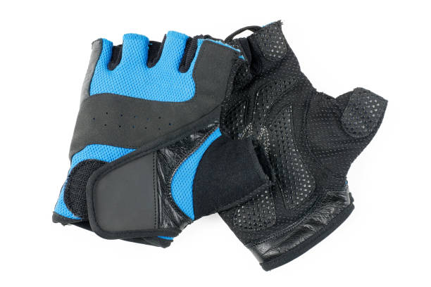 guanti da ciclismo isolati su bianco - sports glove protective glove equipment protection foto e immagini stock