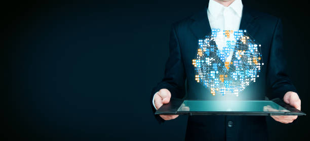 istock businessman hand social network and tablet 964981262