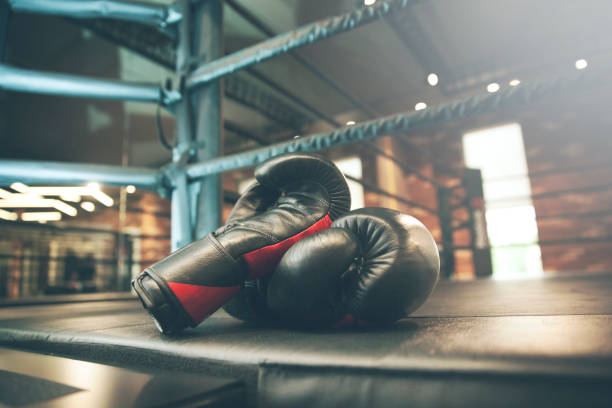 istock boxing glove on boxing ring in gym 964981268