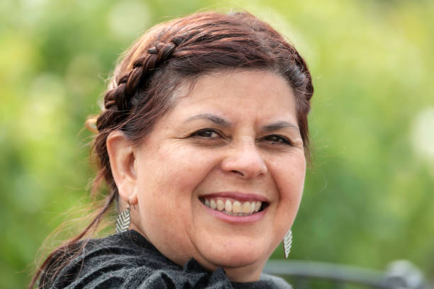 istock Smiling mature woman looking at the camera 964986028