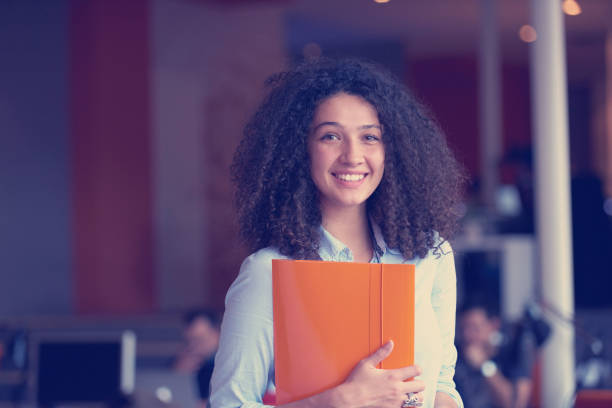 istock young  business woman at office 964988486