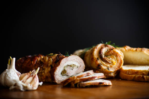 istock Roll of meat with various spices and herbs 964993512