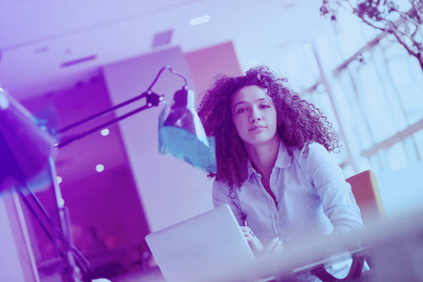 istock young  business woman at office 964999384