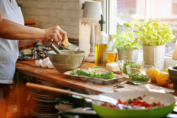 istock Preparing Frittata with Paprika, Spring Onions, Peas, Spinach and Parmesan 965002096