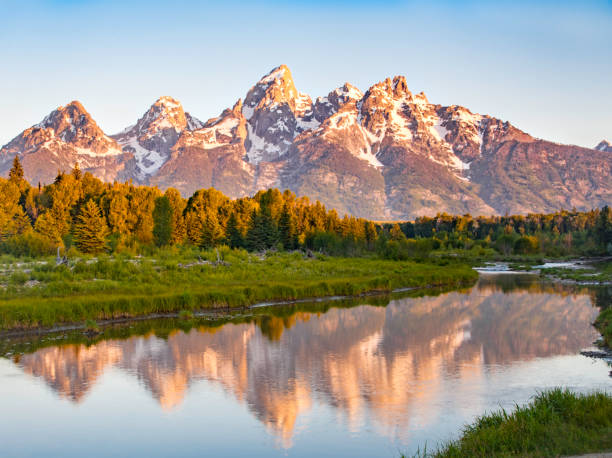 sunrise at grand teton - snake river teton range mountain range mountain imagens e fotografias de stock