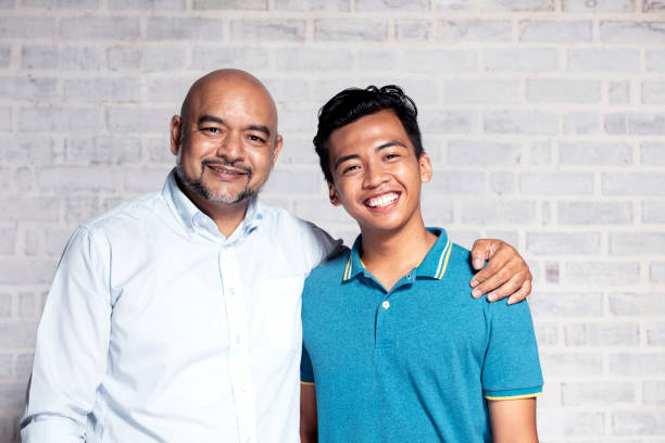 istock Portrait of father and son 965011886