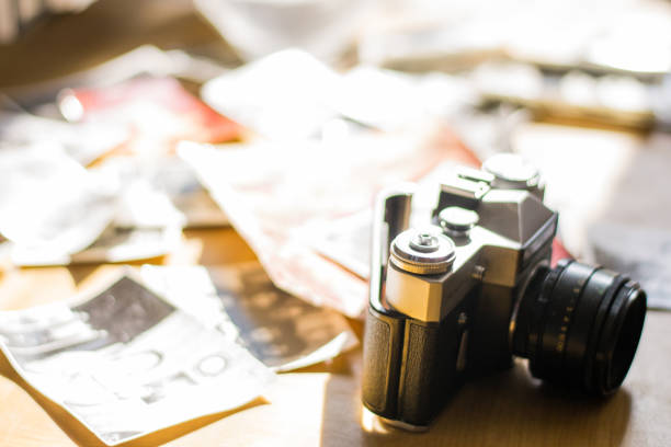 istock Vintage camera lies in black and white photos 965015038