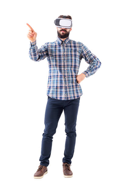 istock Business man with virtual reality glasses doing change or swipe screen gesture. 965021036