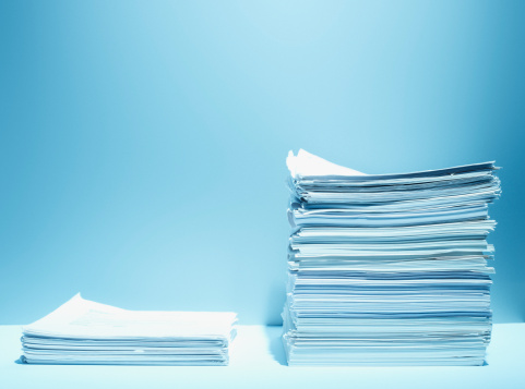 Folders full of business papers blue cardboard document folder business paperwork
