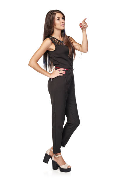 istock Happy business standing pointing to the side 965027800