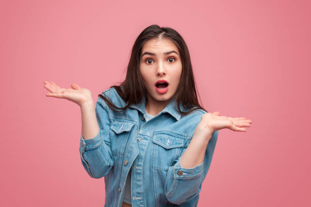 istock Ignorant expressive girl with hands apart 965048878