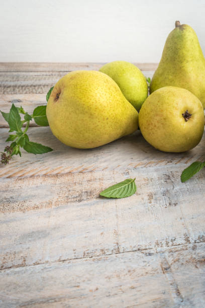 istock Fresh organic pears on old wood. Fruit background. Pear autumn harvest 965053952