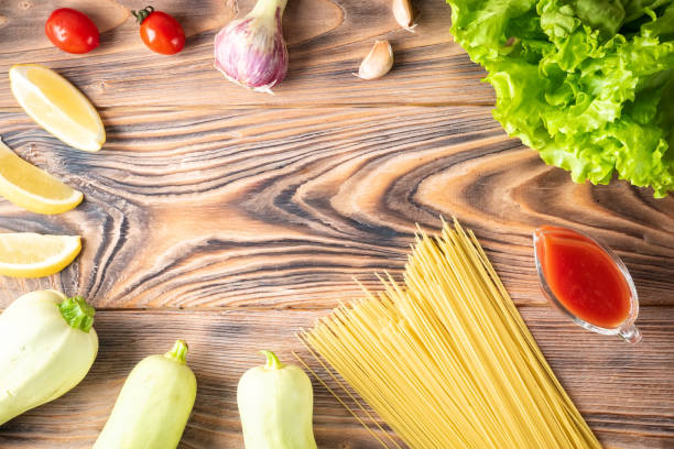 istock Food background Uncooked Pasta Macaroni Spaghetti Cappellini 965066366