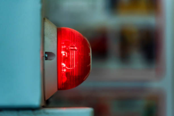istock Red industrial signal lamp close 965067042