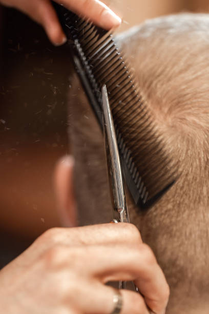 istock Barber and bearded man in barber shop 965067170