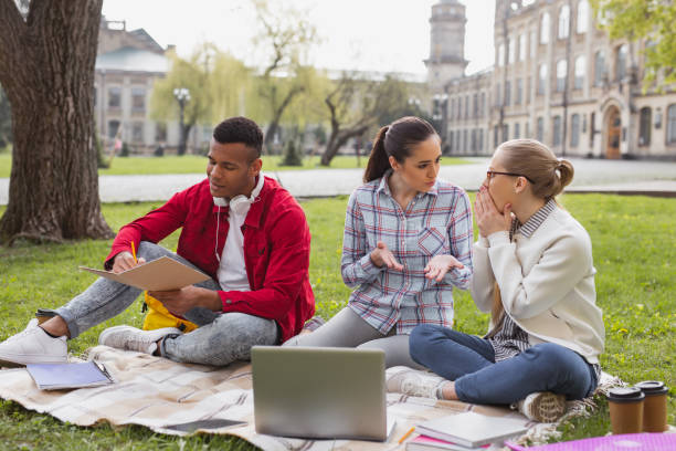 istock Blonde-haired student feeling shocked after hearing rumor 965073006