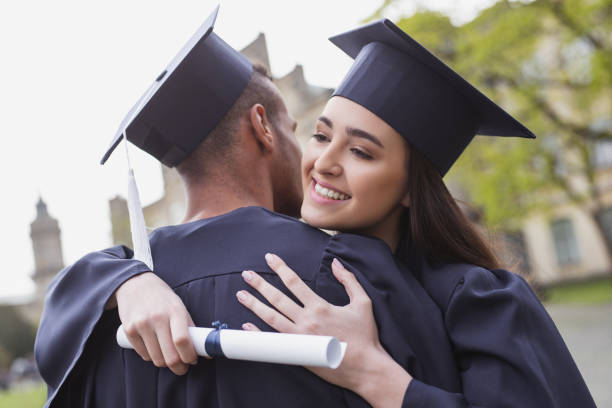 istock Happy graduate enjoying precious moments 965080776