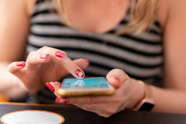 istock Woman hands typing on mobile smartphone 965090266
